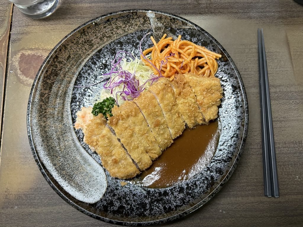 Plato de Tonkatsu en restaurante Michelin